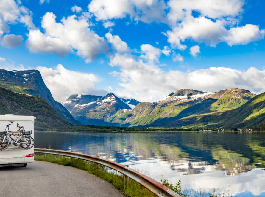 Family vacation travel RV, holiday trip in motorhome, Caravan car Vacation. Beautiful Nature Norway natural landscape.