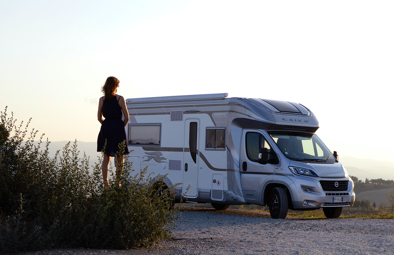 Lady looking at Class B RV