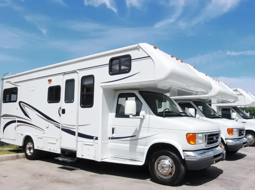 Class C motorhomes lined up.