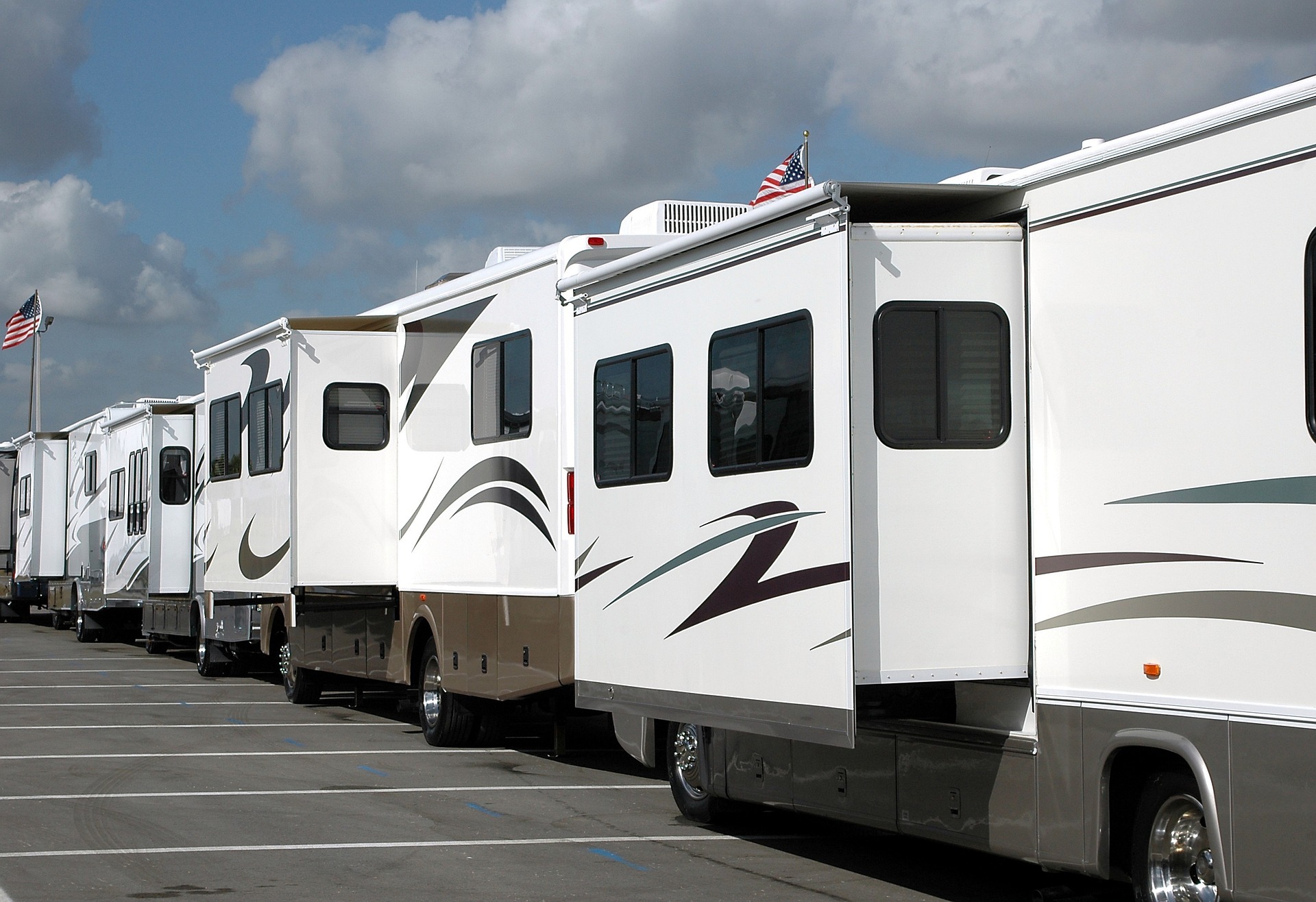 Row of Class A motorhomes with slideouts extended