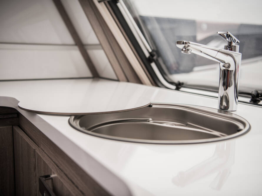 Circular RV Camper Sink and Faucet. Elegant Recreation Vehicle Interior.