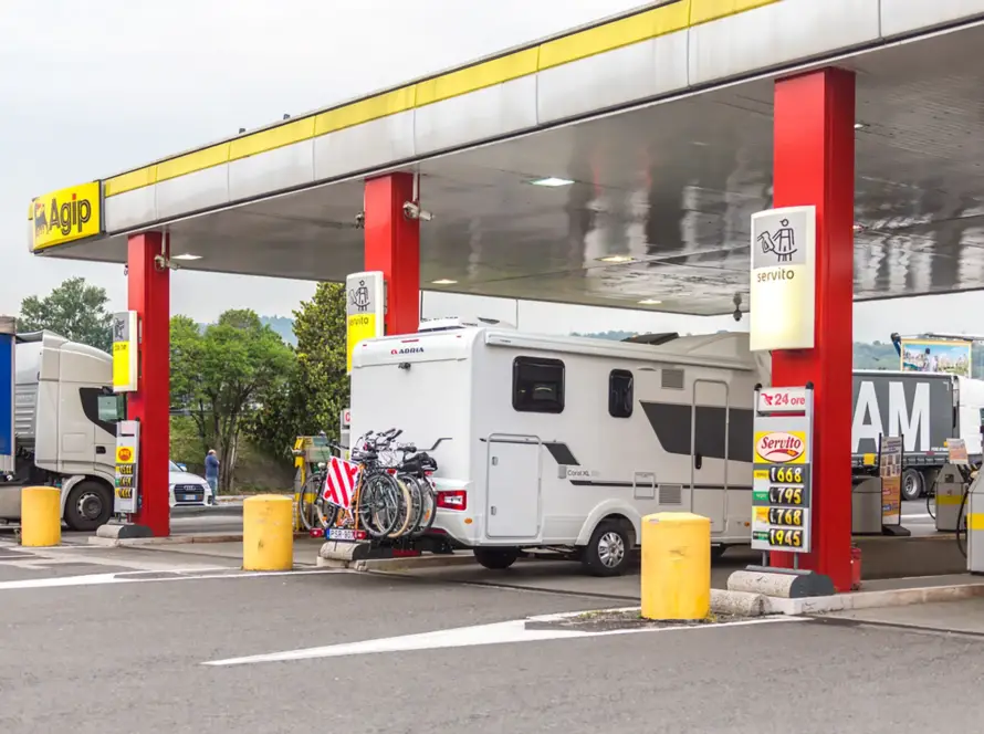 RV getting gas.
