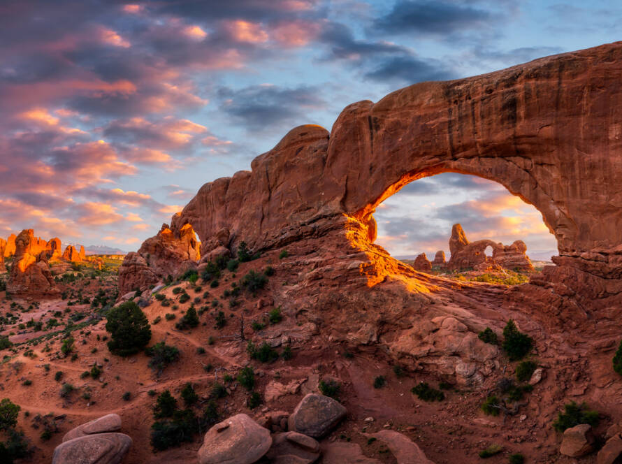 Scenic sky over the North Window arch with Turret Arch in the background from Utah's Arches National Park