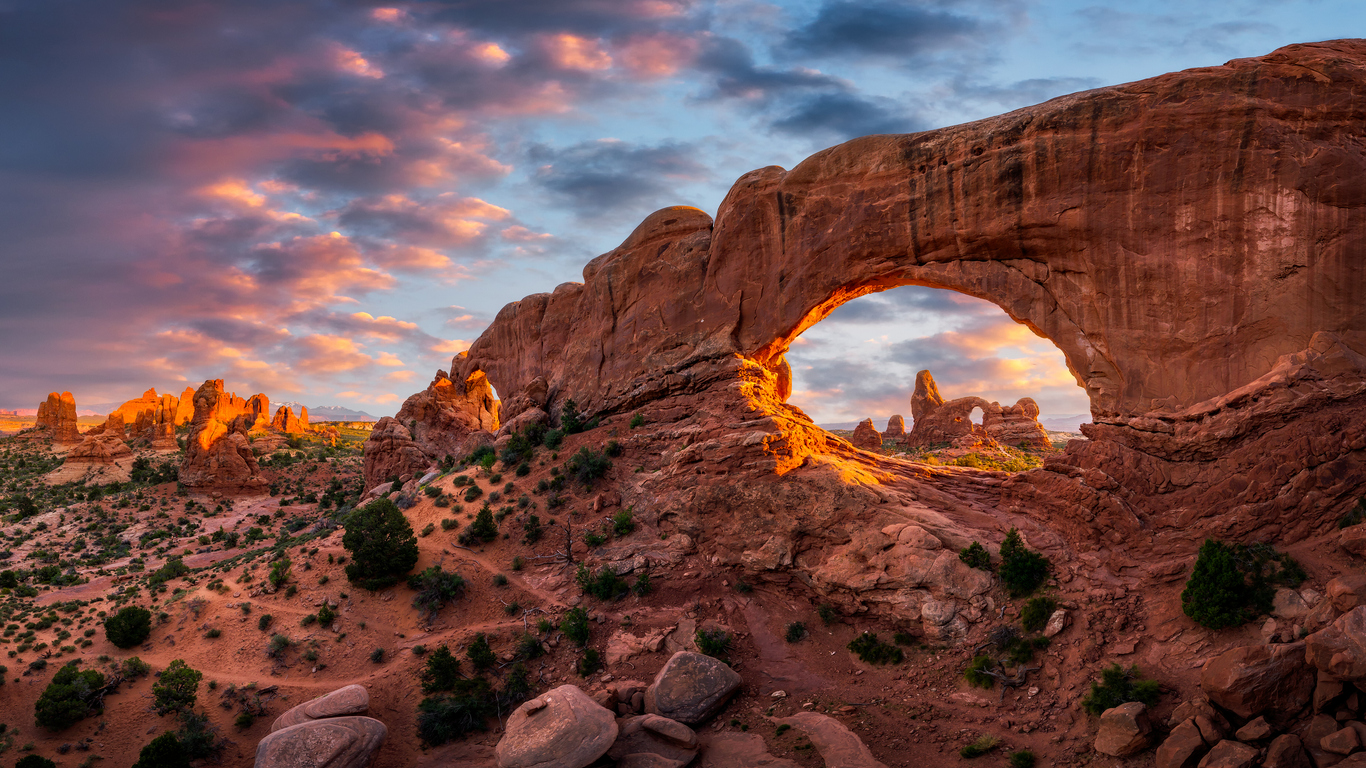 Scenic sky over the North Window arch with Turret Arch in the background from Utah's Arches National Park
